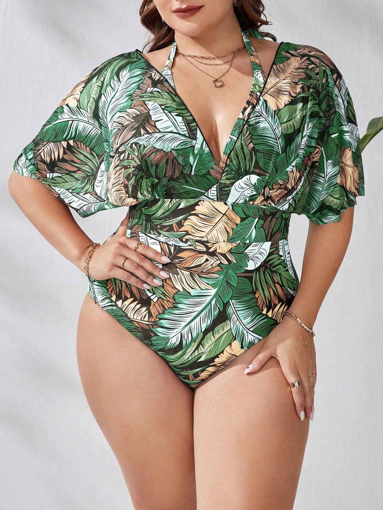 Maiô feminino com mangas transparentes caídas