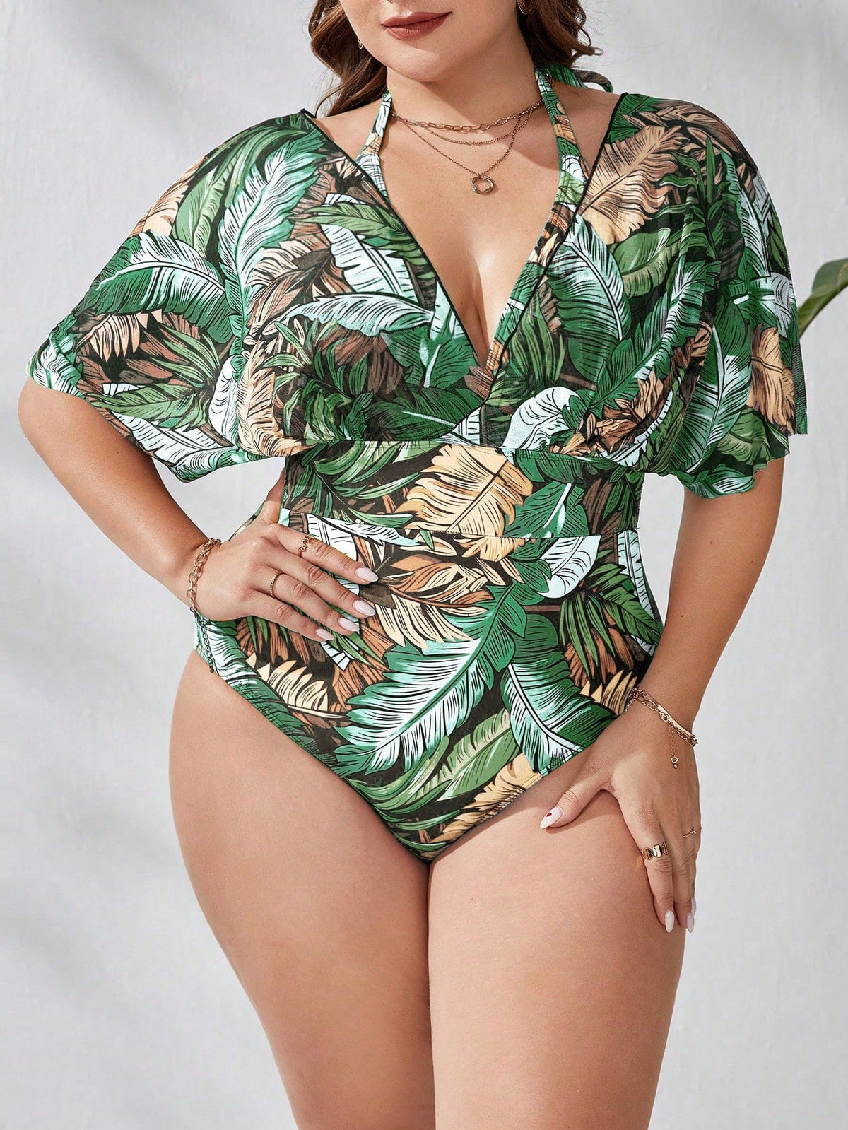 Maiô feminino com mangas transparentes caídas